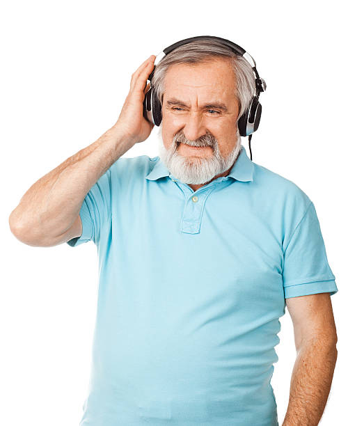 istock Senior with headphones smiling 166681017