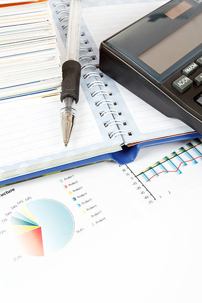 istock calculator, charts, pen, business cards, notes, workplace businessman 166681680