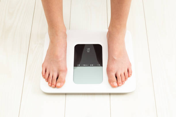 istock A child's feet on a scale. 1666821923