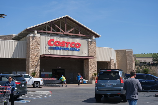 Folsom, California, USA - April 16, 2023: Costco Wholesale storefront in Folsom, California on a late afternoon. Costco Wholesale operates an international chain of membership warehouses, carrying brand name merchandise at substantially lower prices.