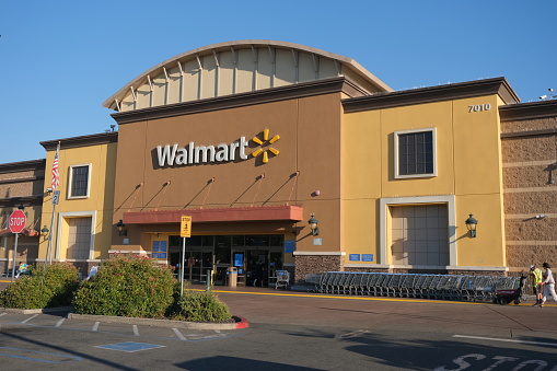 Citrus Heights, California, USA - July 18,2023: High sun over Walmart Supercenter in California. Walmart is an American public multinational corporation that runs chains of large discount department stores and warehouse stores.