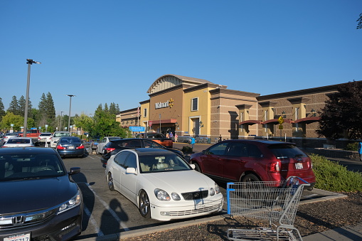 Citrus Heights, California, USA - July 18,2023: High sun over Walmart Supercenter in California. Walmart is an American public multinational corporation that runs chains of large discount department stores and warehouse stores.