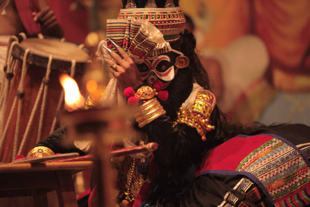 This image is the posture and facial expression of famous indian classical dance kathakali. which is performed at south indian state of kerala.