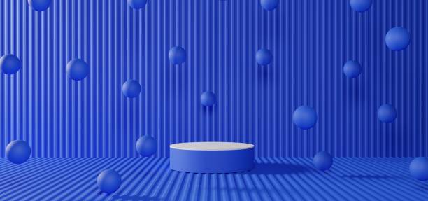 istock blue podium with balls in the blue room.3d rendering. 1666894682