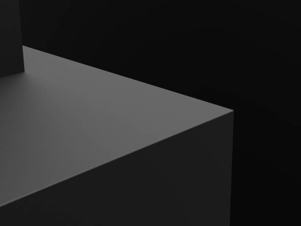 istock Black podium or pedestal display on dark background with cube platform for product showcase. 3d rendering. 1666894693