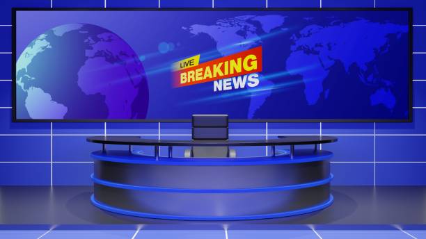 istock glass table and lcd background in the news studio room.3d rendering. 1666930920