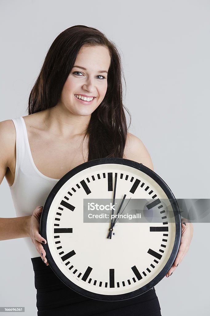 Jovem mulher com relógio - Royalty-free Adulto Foto de stock