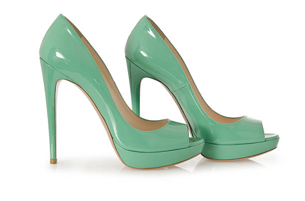 istock Woman green shoes isolated on white 166696479