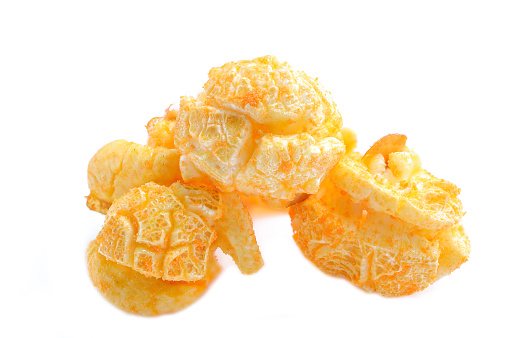Popcorn with cheddar cheese on white background. Delicious cheese popcorn