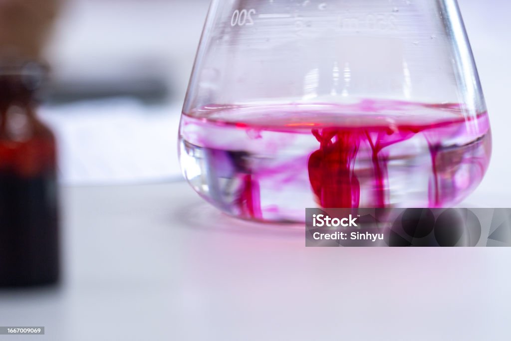 pH testing in food and Encapsulation Experiment example in the laboratory Acid Stock Photo