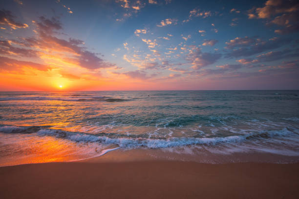 istock Beautiful sunrise over the sea 1667053695