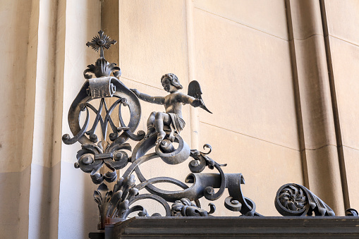 Saragossa, Spain- August 14, 2023: Wrought iron religious motifs on the door of the Cathedral-Basilica of Our Lady of the Pillar