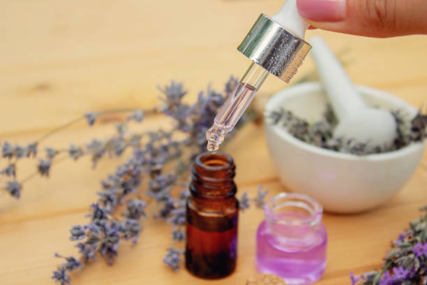 istock lavender essential oil, on a wooden background. Selective focus 1667105781
