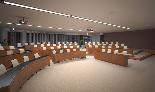 Interior of large modern office training room with large curved monitor screen for presentation and  ceiling TV monitors, 3D rendering