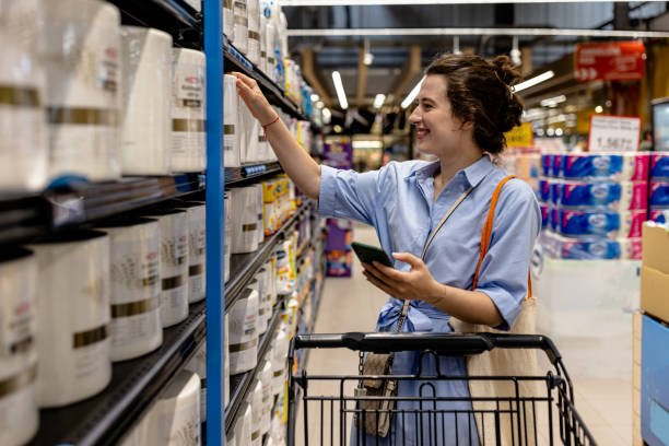 istock Young woman ventures through the store 1667129534