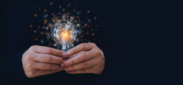 istock Hand holding light bulb  with network icons. 1667152355