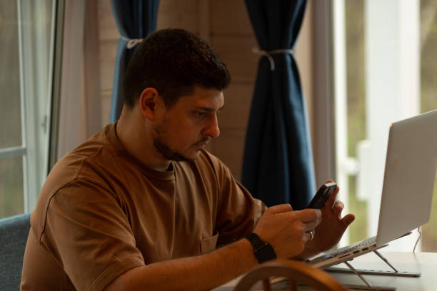 istock A man works on a laptop from home, runs a small business 1667162430