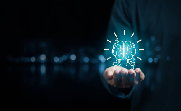 istock Idea concept. businessman with brain icon in hand, creativity, learning and brainstorming 1667182361