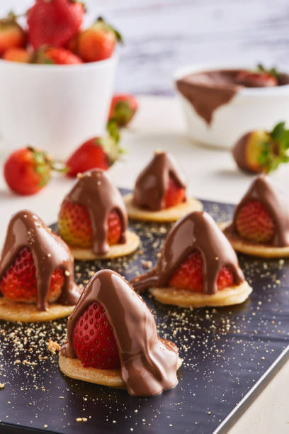 istock Mini Strawberry Pancake dip with chocolate served in dish isolated on background top view of cafe food 1667183432