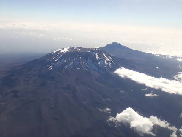 istock Two mountains seen from 40,000 feet aboard a boeing 787-800 dreamliner 1667207643