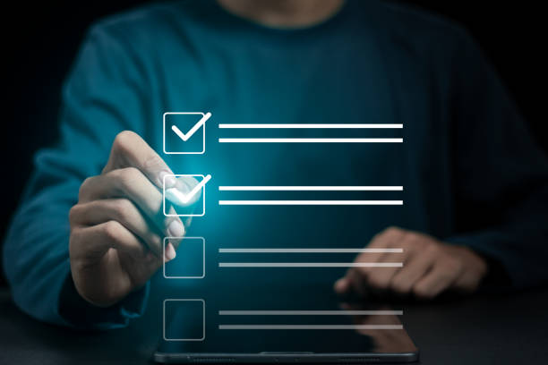 istock Business project approval concept,  businessman using a pen to mark the correct checkboxes. 1667216962