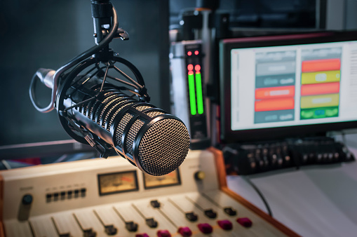 Professional microphone and sound mixer in studio