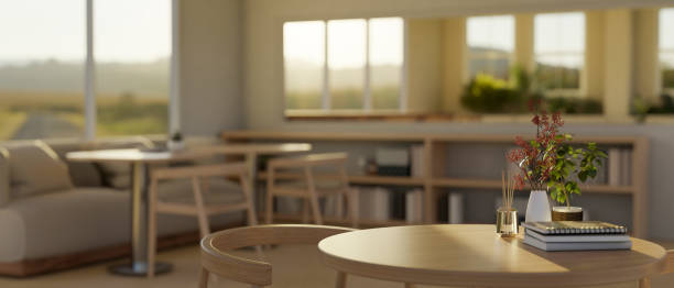 istock Copy space on a wooden round table in a modern and comfortable coffee shop or cafe. 1667224590