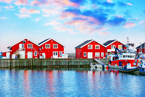 Red rorbu buildings in Bodo harbor, Norway