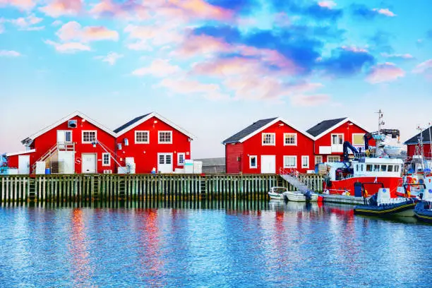 Red rorbu buildings in Bodo harbor, Norway