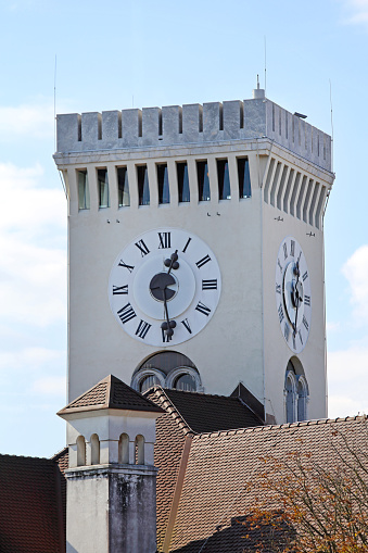 Large Public Clock at Tall Castle Tower in Ljubljana Slovenia Landmark