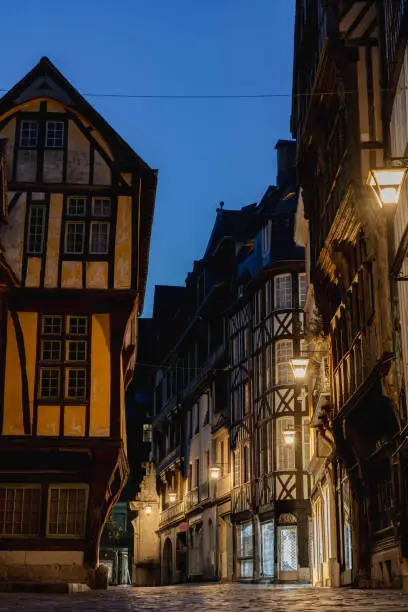 Photo of France, Streets and houses in Rouen by night.