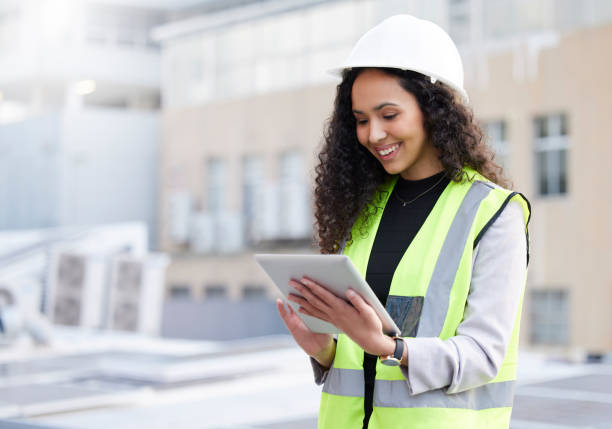 istock Engineering, tablet and a woman outdoor for planning, search or communication for project. Female engineer with technology in a city for construction, management or app for maintenance and inspection 1667298575