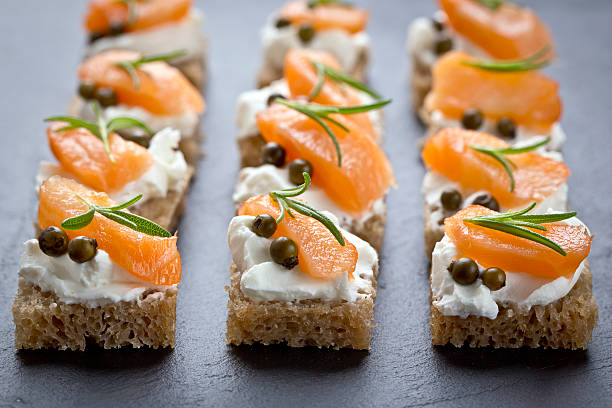snacks with smoked salmon delicious catering finger food seafood gratin stock pictures, royalty-free photos & images