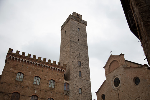 San Gimignano is a commune in the province of Siena in the Tuscany region of central Italy and a well-preserved medieval town surrounded by walls.\nIn the place called \