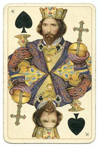 This is the King of Spades from a well-known deck of vintage /antique (19th century) playing cards. It was printed in chromolithography by Bernard (Bernhard) Dondorf from Frankfurt aM, Germany, and the deck included characters from Shakespeare's plays as face cards. The King of Spades is illustrated as Claudius, King of Denmark from the play (Hamlet). Bernard (Bernhard) Dondorf opened a lithographic printing business in 1833, first producing playing cards in 1839. His playing cards were popular for their designs and overall quality. He retired from the business in 1872 after producing popular and widely-copied designs for many years.