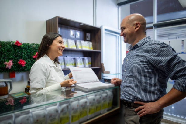 istock Woman attending herbalist business 1667397375