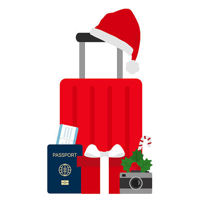 Christmas Vacation Concept With Suitcase, Santa Hat, Photo Camera, Gift Box, Passport And Airplane Ticket On White Background