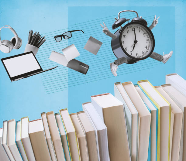 istock Vintage alarm clock running over books 1667409066
