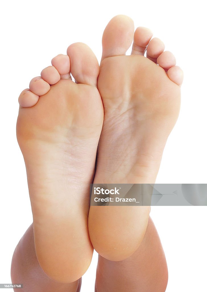 Женщины ноги с гладкой кожи на один на белом фоне - Стоковые фото Вертикальный роялти-фри