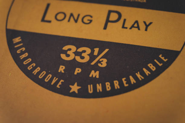 long play 33 rpm microgroove unbreakable words only vintage old 1940s 40s retro design - 33 rpm imagens e fotografias de stock