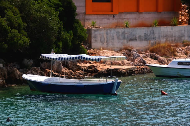 istock Picturesque Boat on the Promenade 1667503671