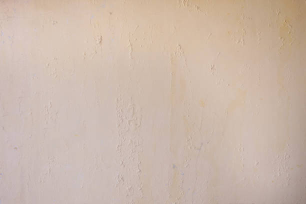istock White cement texture stone concrete,rock plastered stucco wall 1667504190