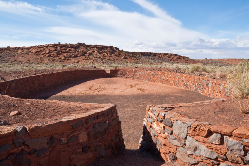 Ball courts were common in southern Arizona from 750AD to 1200AD. Archaeologists think that the concept of the ball court may have been borrowed from the indigenous cultures of Mexico. The fact that there is a ball court this far north in Arizona suggests that there may have been social interaction between the people at Wupatki Pueblo and the Hohokam people of Southern Arizona. Archaeologists don’t know the specific uses of the ball court but the existence of over 200 ball courts in Arizona suggests that ball games may have played an important social role in the lives of the people at Wupatki and their southern neighbors. Wupatki Pueblo is in Wupatki National Monument near Flagstaff, Arizona, USA.