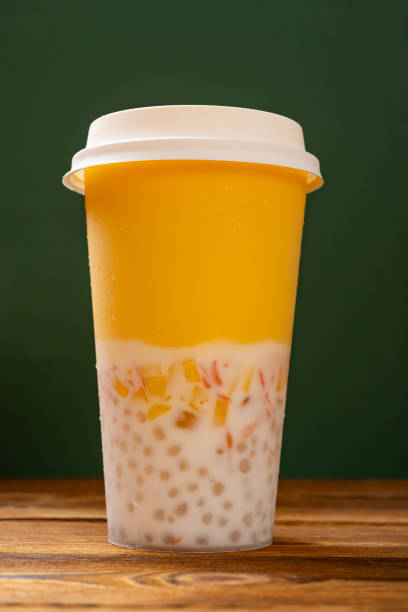 cup of mango pomelo sago dessert vertical composition