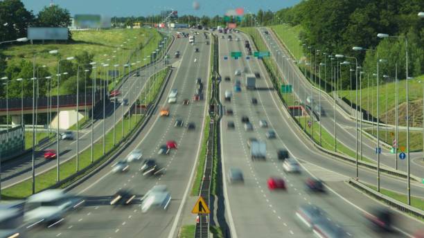 istock Busy Highway Traffic Cinemagraph Time Lapse 1667563213