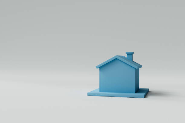 3D blue house on white studio background with copy space.