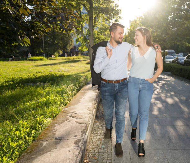 istock Couple romantic walking in city park 1667591503