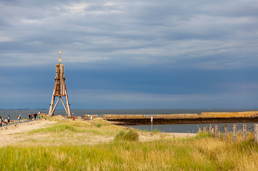 The old wooden tower on the North Sea coast in Cuxhaven, Germany