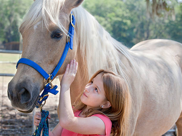 istock Young Girl with Horse 166759773