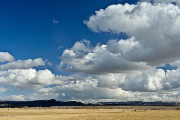 Late afternoon cloudscape horizon with mountains in the distance, Graaff-Reinet, South Africa